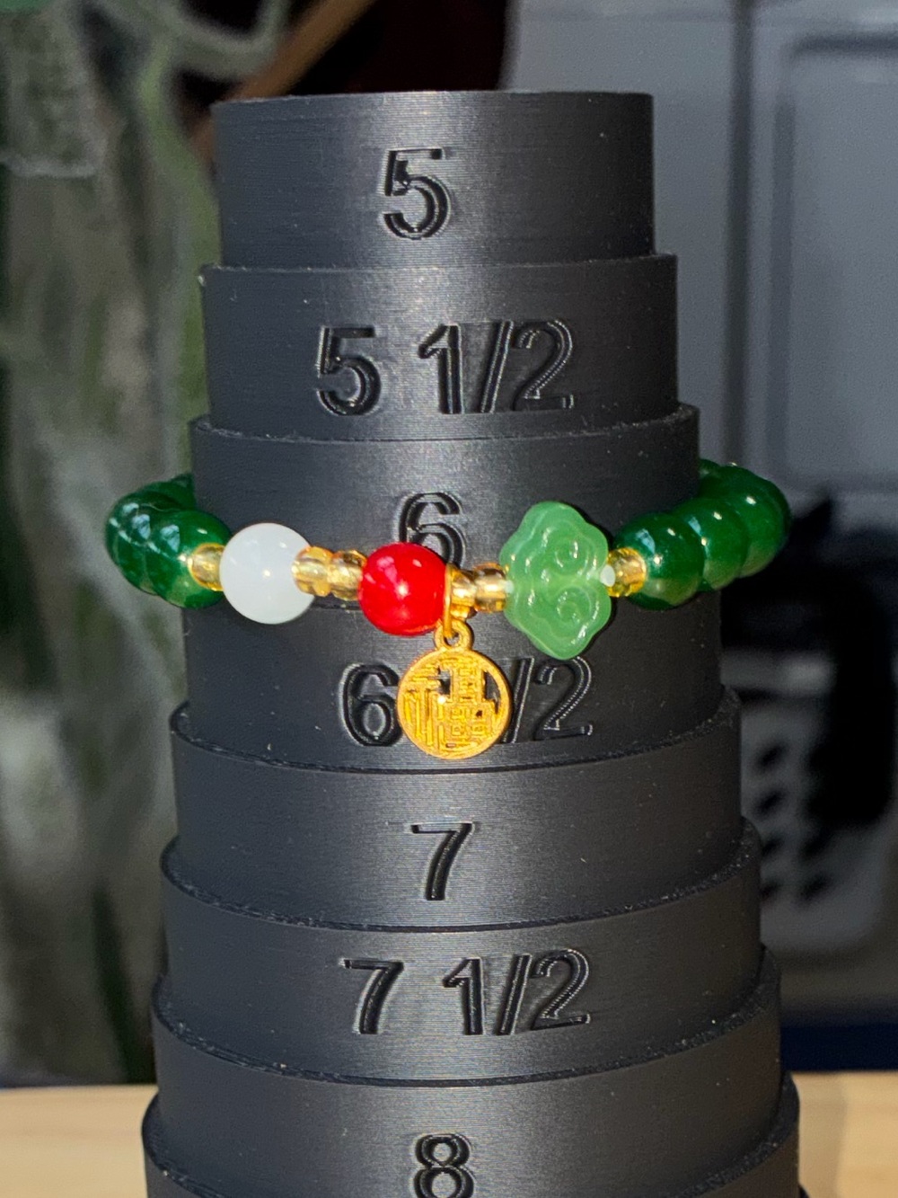 Green Jade Glass Beaded Bracelet with Red & White Accents and Gold Charm